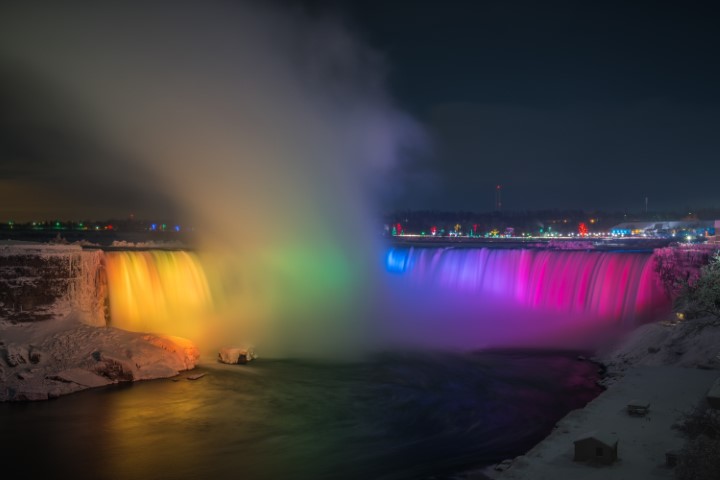 niagara falls lit up with colourful lights