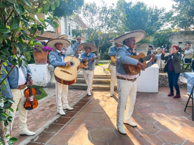 mariachi band playing to a crowd in mexico