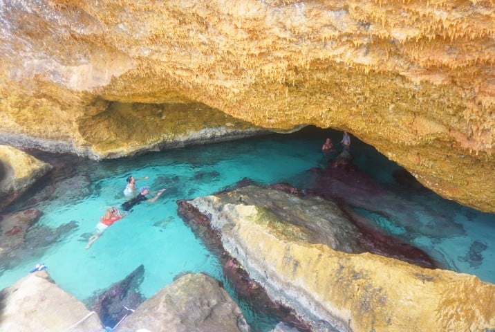 natural pools amongst the cliff face in aruba, one of the Best Countries to Visit in September
