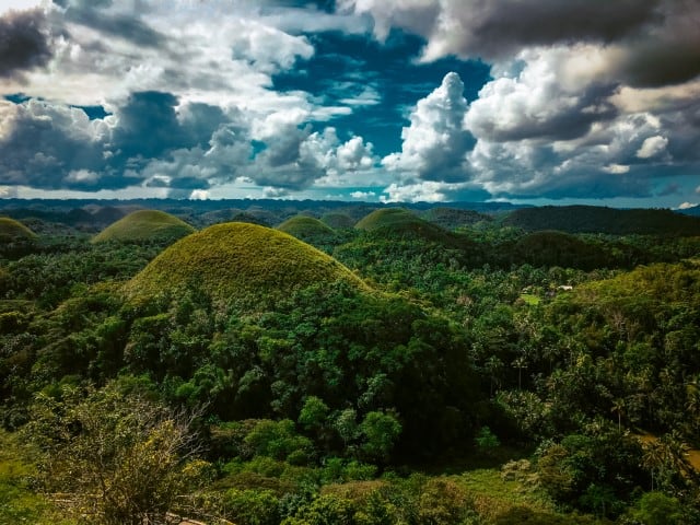 round mountains covered in greenery (the chocolate mountains) in bohol, the philippines